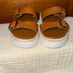 Mythiccal Slip-On Buckled Banded Platform Raffia Sandals